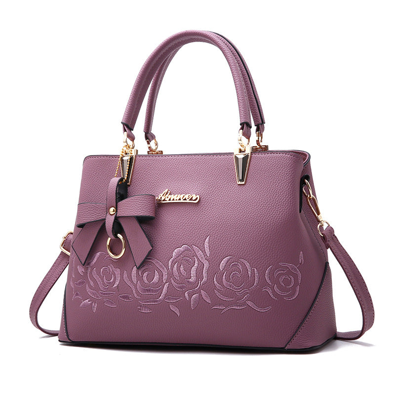 Elegant & Stijlvol – Luxe Handtas met Bloemenborduursel en Strikdetail 