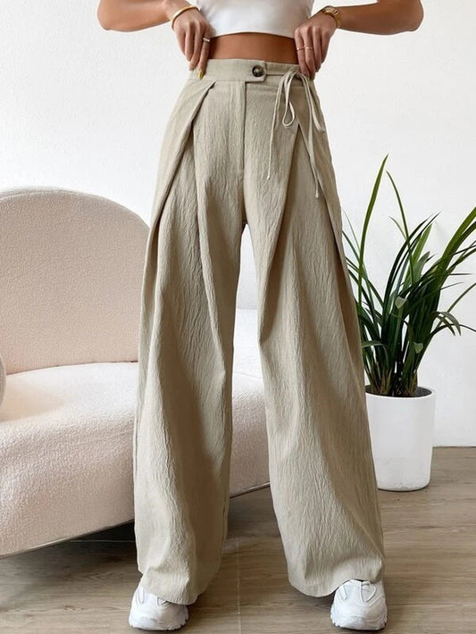 Highwaist luchtige broek - Powerful. Chic. Boss.
