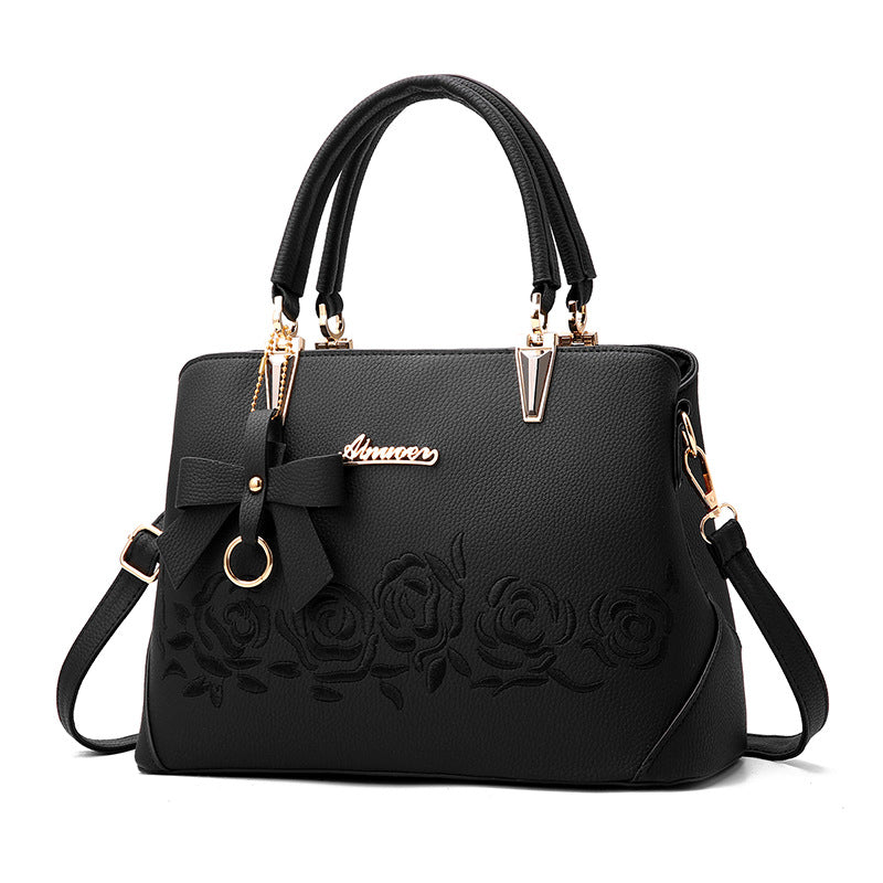 Elegant & Stijlvol – Luxe Handtas met Bloemenborduursel en Strikdetail 